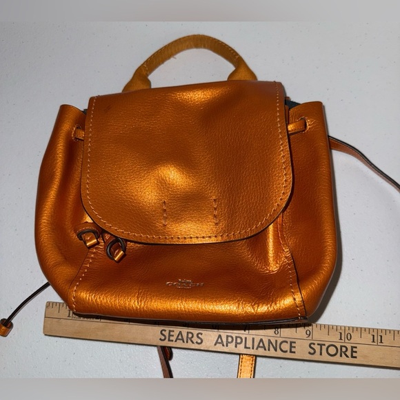 Coach Metallic Derby Backpack in tangerine orange pebbled leather main image 16